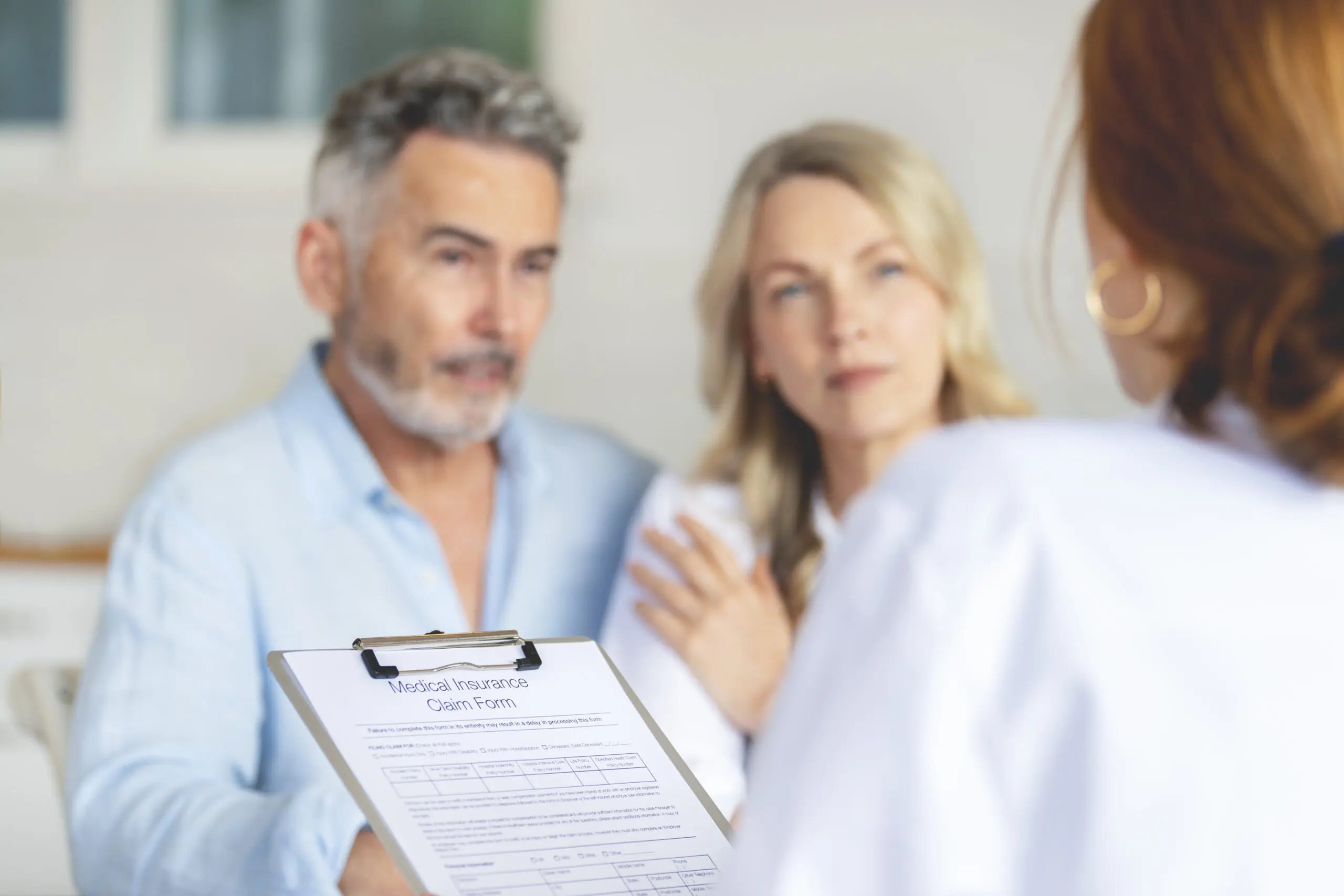 Couple discussing with doctor