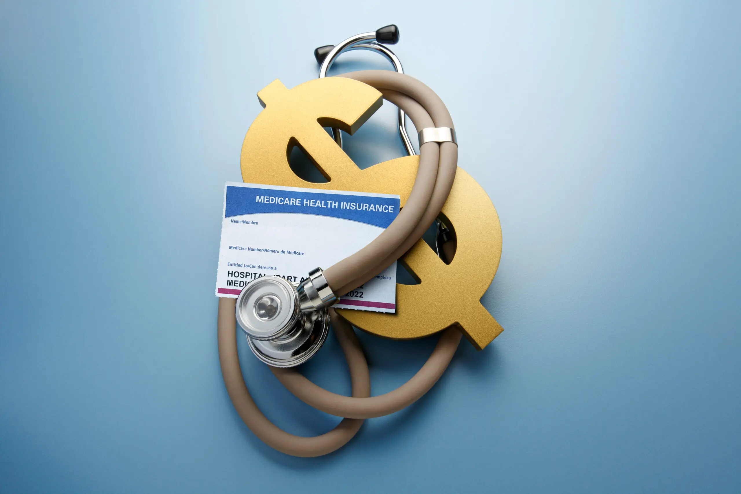 Medicare insurance with stethoscope and dollar sign